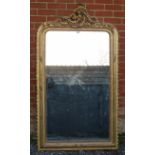 A large 19th century French over mantle mirror, in an ornate gilt gesso frame with beaded edging and