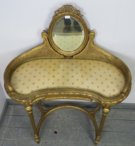 A vintage French giltwood dressing table, the double skin bergère gallery supporting a bevelled oval - Image 3 of 3