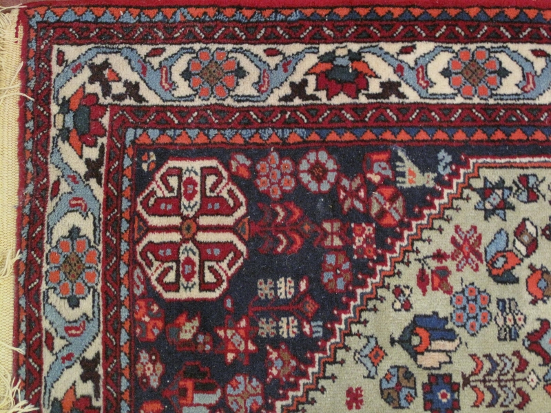 A Persian rug, 20th century, decorated with a central lozenge medallion amidst stylised motifs and - Image 4 of 5