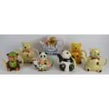 Seven bear and panda themed novelty teapots including one Beswick and one by Tony Wood. Tallest