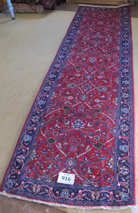 North West Persian Sarouk runner. Central foliage on claret ground and repeat blue border. Good - Image 2 of 3