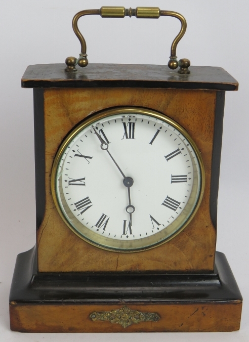 A small French Ormulu mounted mantle clock with half ebonised walnut case and enamel dial. no key.