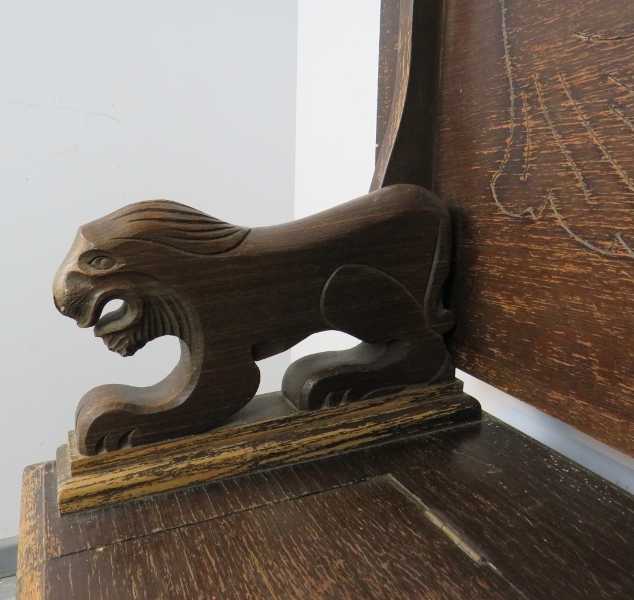 An antique oak monk’s bench, with metamorphic backrest and carved arms in the form of lions, over - Image 5 of 6