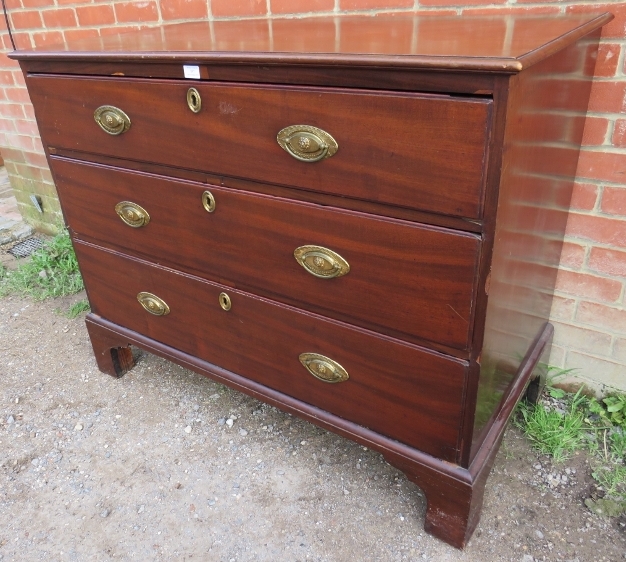 A George III mahogany straight front chest of three long graduated oak-lined drawers with pressed - Image 2 of 3