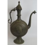 A finely decorated Indian bronze ewer of large proportions. Height 54cm. Condition report: Repair to