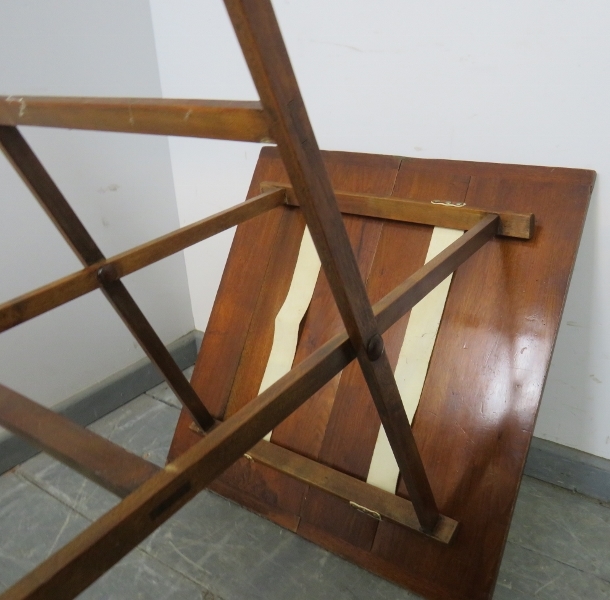 A 19th century mahogany folding campaign card table, with cast iron fittings, the canvas straps - Image 4 of 5