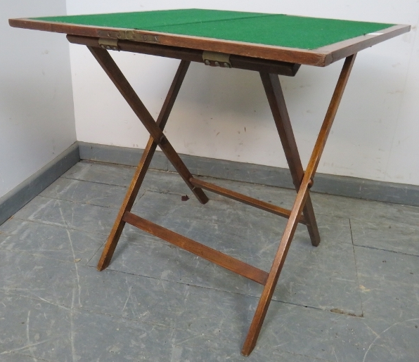 A 19th century mahogany folding campaign card table, with cast iron fittings, the canvas straps - Image 2 of 5