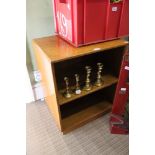 A 20TH CENTURY LIGHT OAK FINISHED SET OF OPEN SHELVES on a recessed plinth base