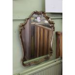 A FANCY GILT FRAMED PLAIN PLATE WALL MIRROR