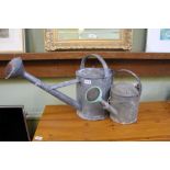 Two useful and decorative galvanised garden watering cans