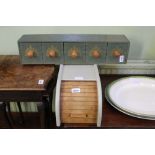 A PART PAINTED WOODEN BREAD STORAGE BOX and a five drawer spice shelf