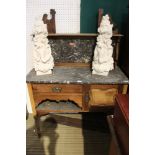 AN EARLY 20TH CENTURY MARBLE WASHSTAND with splashback and top, the wooden base unit having single