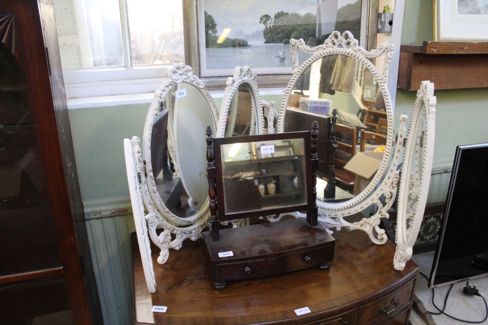 A trio of dressing table mirrors to include two Marie Antoinette framed oval triple plates, the