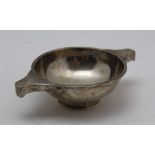 Wilson & Sharp, an early 20th century Scottish silver quaich of plain form, Edinburgh 1921, the bowl
