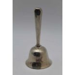 Barker Brothers Silver Ltd. A silver table bell, Birmingham 1954, 11cm high, 5.3cm mouth, weight;