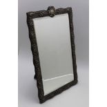 Henry Matthews, a late Victorian embossed silver framed dressing table mirror, floral & acanthus
