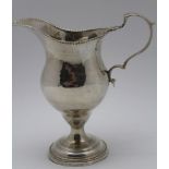 William Withers, A George III silver cream jug, of baluster form, with beaded rim and double
