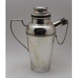 A James Dixon of Sheffield silver plate cocktail shaker, fitted handle, the spout cork cap has a