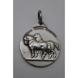 Mappin & Webb, a silver 'Shire Horse Society' medal, cast one side with a pair of Shires in harness,
