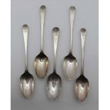John Lampfert, a set of four mid-18th century silver dessert spoons, London 1759, remains of gilding