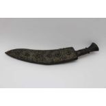 An Indian or Nepalese kukri, curved single edged blade, horn handle, bead inset and wire filigree