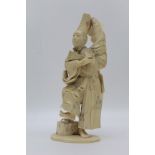 A Japanese Meiji period carved ivory figure of a standing dancer with fan, a Mons decorated box at