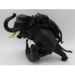 A Japanese Tokyo School bronze elephant and tigers' group, Meiji period, inset ivory tusks,