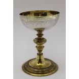 An 18th century Continental chalice, possibly Spanish or Italian, the planished white metal gilt