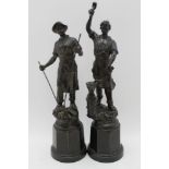 A pair of French spelter figures, bronzed finish, metal workers, on plinth bases, the tallest: