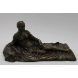 A French bronze, depicts a Renaissance beauty upon her day bed, c.1900, 28cm long