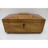 A 19th century maple veneer table casket, hinged cover with early paper lining, fitted decorative