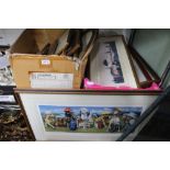 Two boxes housing an extensive selection of decorative prints various