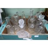 A box containing a selection of decanters and carafes various