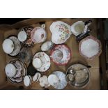 A box containing collectors cups and saucers, a silverplated Pink Rose branded cream and sugar, etc.