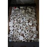 A box containing an extensive collection of Goss crested China wares