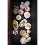 A box containing a large selection of collectable trinket boxes to include enamelled examples