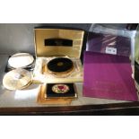 Two cased Queen Elizabeth Golden Jubilee 5 pound coins, together with four various powder compacts