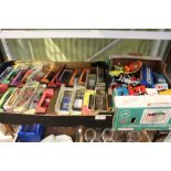 Two boxes housing a selection of collectors diecast vehicles both boxed and loose