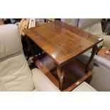 Oak rectangular topped coffee table on four continental stylised cabriole legs