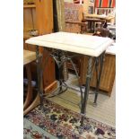 A pair of reconstituted's marble topped lamp tables, each supported on fancy silver coloured metal