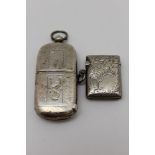 John Gilbert A Victorian silver combination vesta & sovereign case, with suspension ring & chased