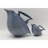 Anthony Theakston (b. 1965) A Studio Pottery blue salt glazed 'Penguin' jug, having fitted handle