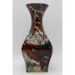 A 'Black Ryden' pottery vase, square form body tapering up to a cylindrical neck & flared rim,