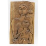 A Far Eastern carved wood panel, depicting a mother and child, 44cm x 25cm