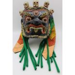 A Balinese allegorical Rakshasa (Demon) mask, Bhoma tribe, painted composition with skull crown