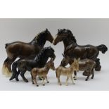 Two Beswick pottery shire horses, three Beswick donkey's & a pony (6)