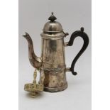 A Georgian design silver plated coffee pot, 17cm high, together with a bone dice, spinning form with