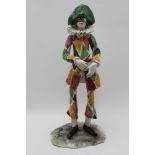 A mid-20th century Italian pottery figure, 'Harlequin', base indistinctly signed, 43cm high