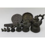 A set of seven 19th century Burmese Hamsa opium weights of stylised bird form, the largest 9cm tall,