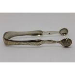 A pair of Scottish provincial silver sugar tongs, by Thomas Davie of Greenock, c.1820, with